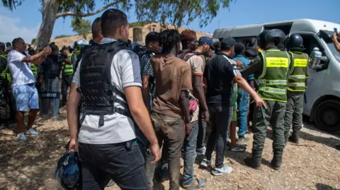 Morocco detains dozens of migrants trying to cross into Ceuta, reports say