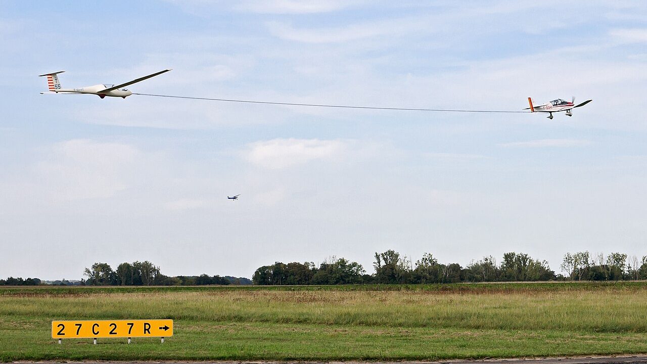 A glider being towed into the air