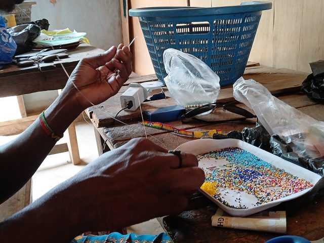 A bead maker at the National Cultural Centre