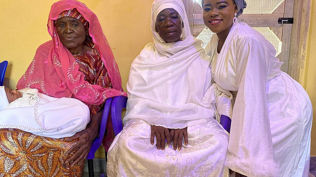 A family with their newborn baby