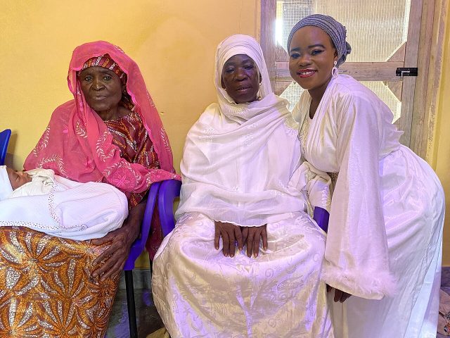 A family with their newborn baby
