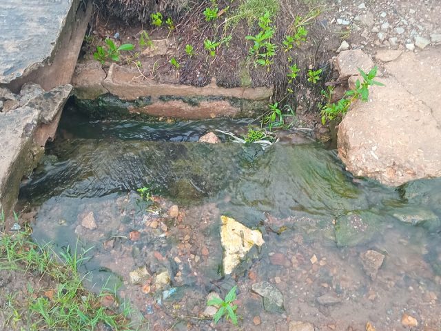 Rainwater in a gutter in Dome, Accra