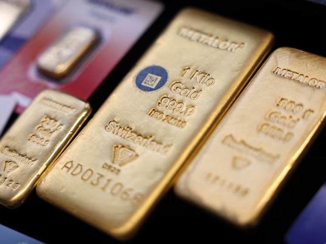 Gold edges higher on softer oil; Fed rate outlook in focus