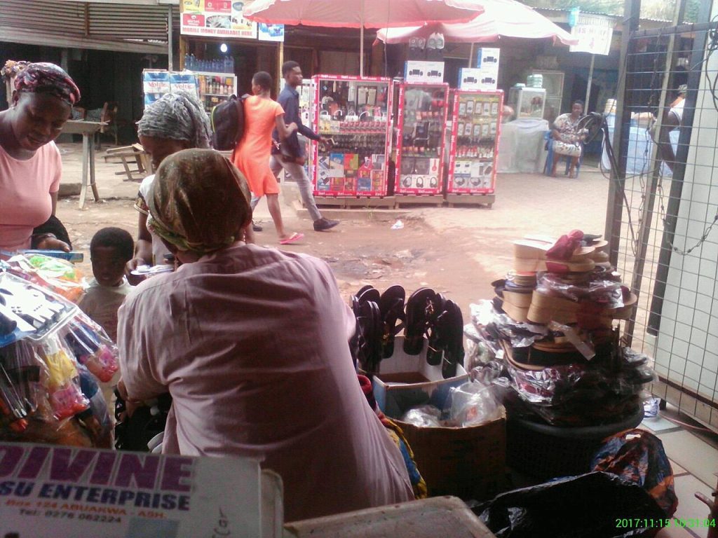 A market woman selling second-hand clothes in Ghana
