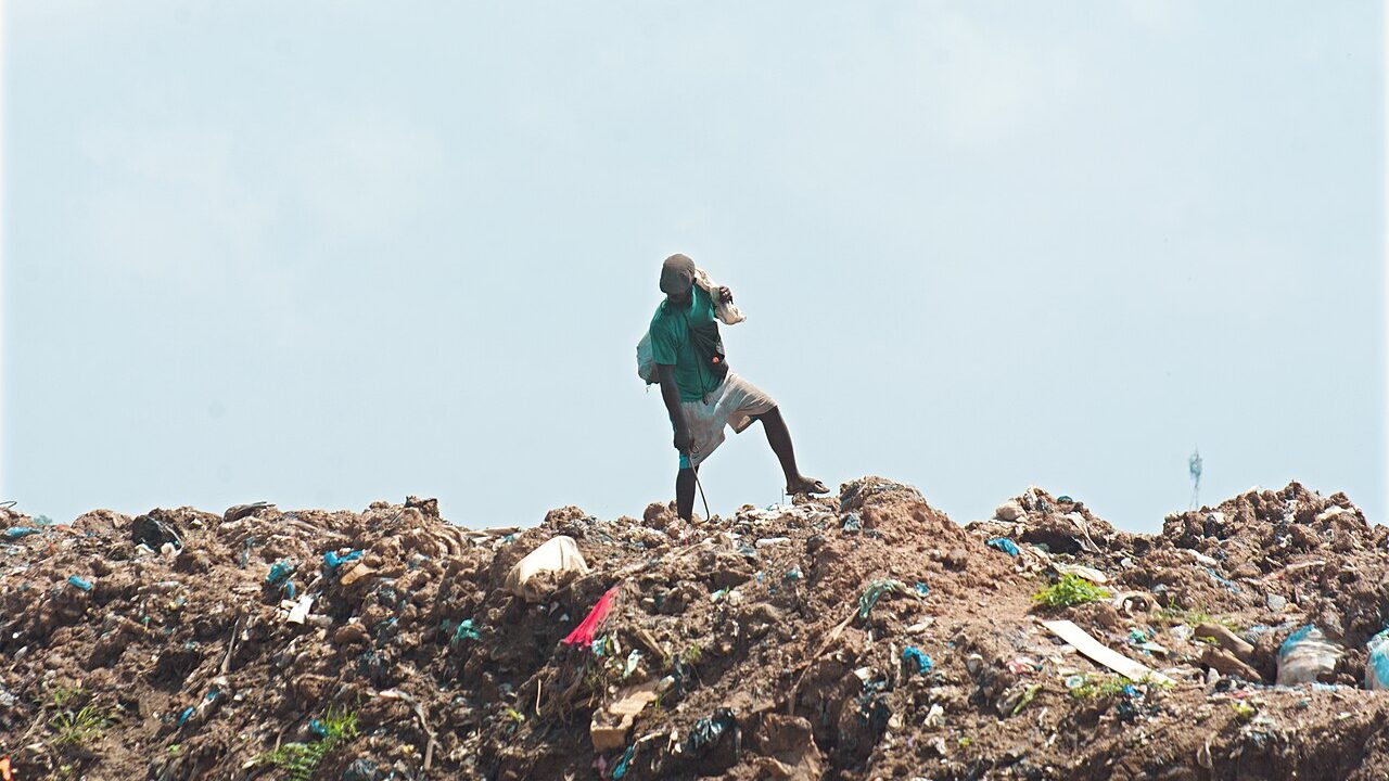 A waste picker at a landfill site in Ghana
