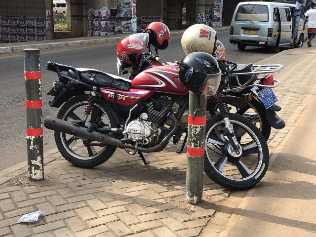 A motorcycle taxi in Madina, Accra