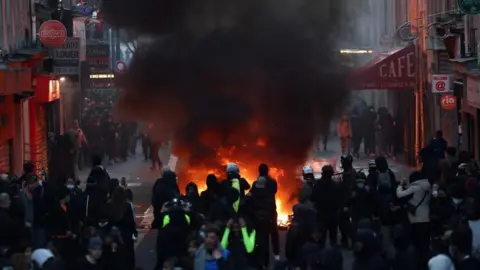 Paris extends curfew as Marseille and Lyon ban protests after riots