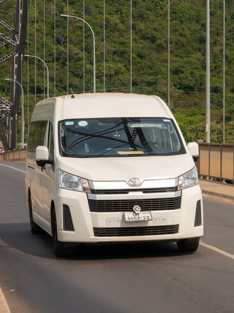 An Intercity STC minibus crossing the Adomi Bridge