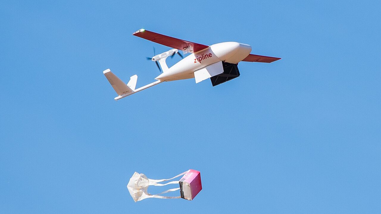 A Zipline drone dropping a package