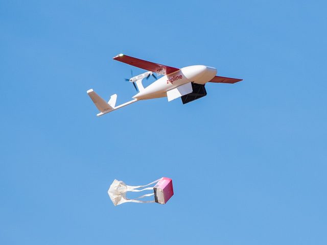 A Zipline drone dropping a package